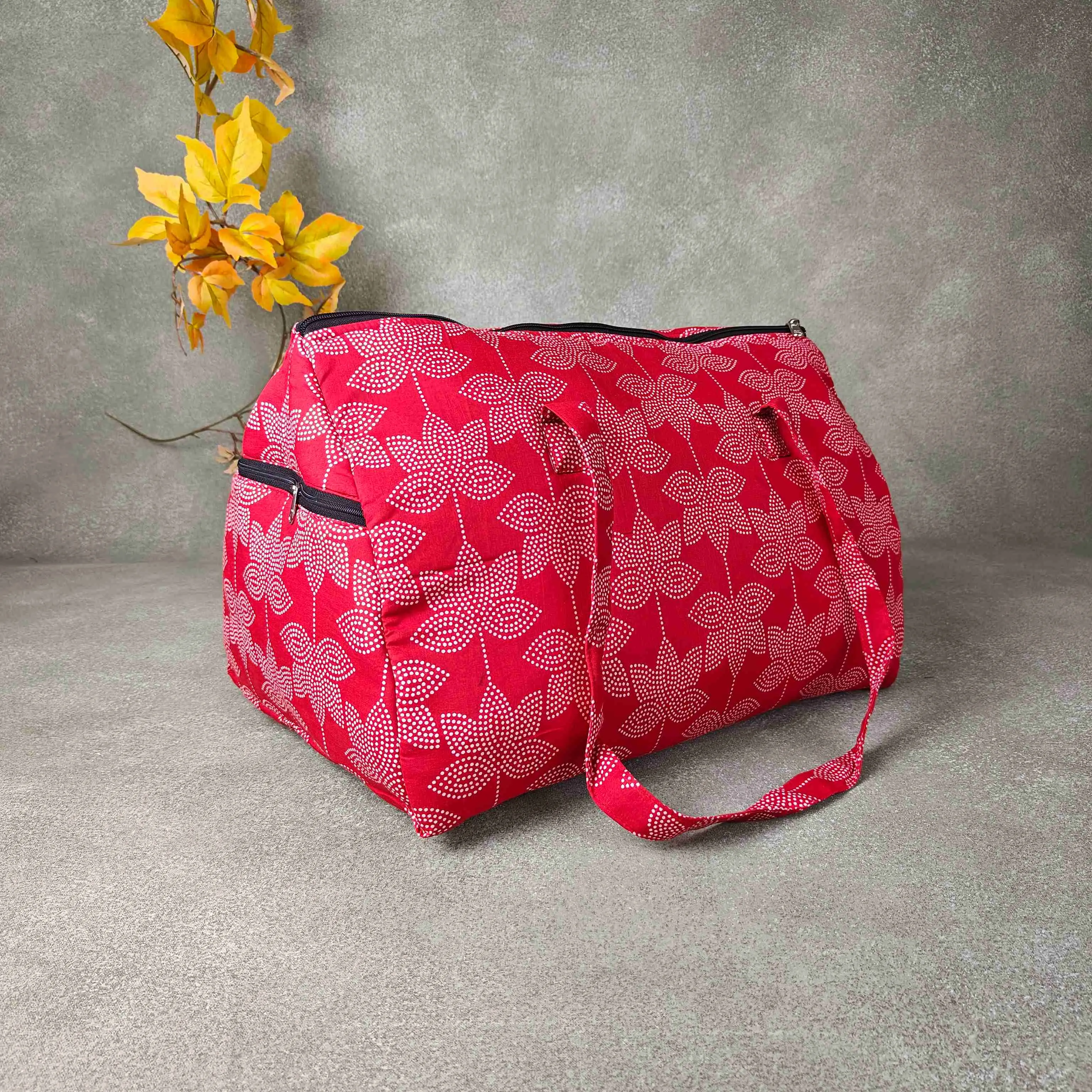 Weekender Travel Bag Red Colour with White Big Leaf Printed Design.